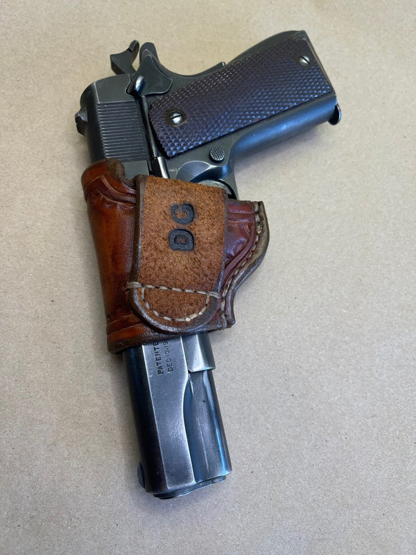 The "Slim" Holster for the Colt 1911 Govt. Model and Commander..... Handmade from Saddle Leather.