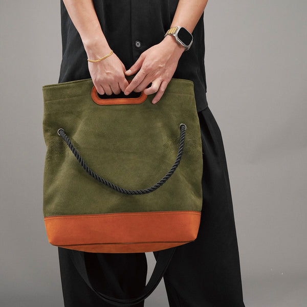 KAKAVY TRIO bag carried by its leather-trimmed cutout handles